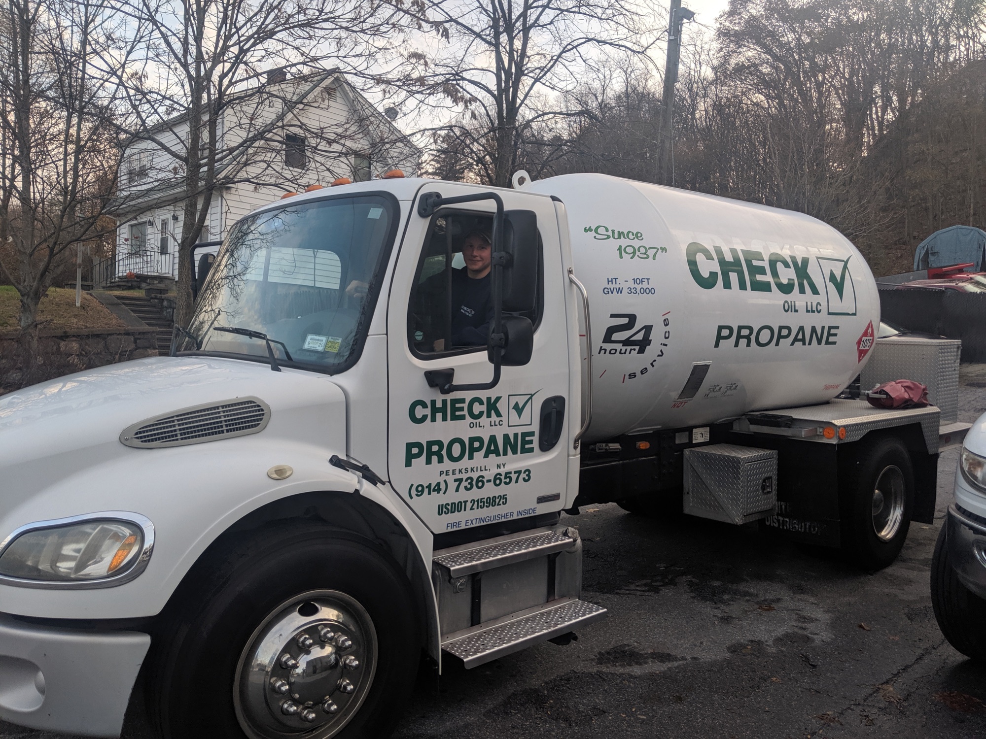 Check Oil and Propane delivery team